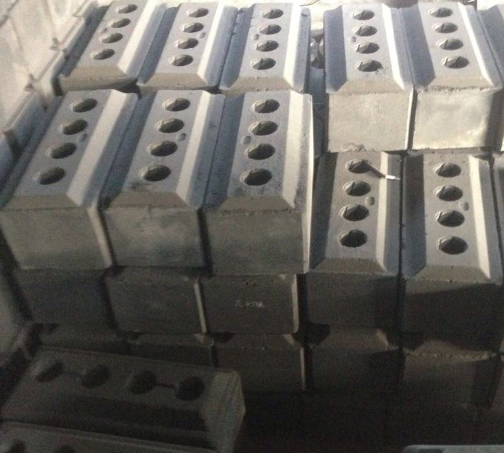 Proceso de producción de bloque de carbón de ánodo precocido.